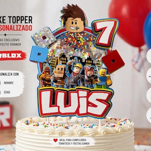 May include: A personalized Roblox cake topper with the name "LUIS" and the number 7. The topper features Roblox characters, a cityscape, and the text "Cake Topper Personalizado". It is designed with a shaker effect and is suitable for themed birthday parties.