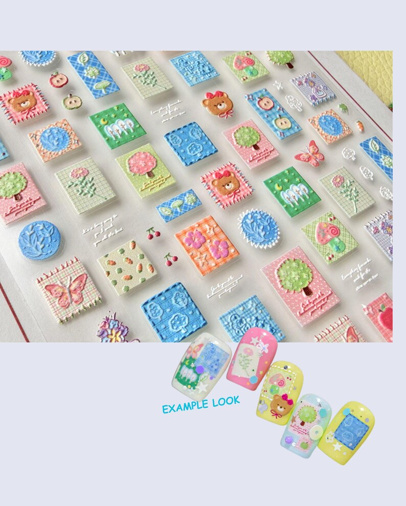 May include: A sheet of colorful nail art stickers featuring various designs, including teddy bears, trees, flowers, and butterflies. The stickers are in a variety of pastel colors and have a 3D embossed effect. The phrase "EXAMPLE LOOK" is also visible.