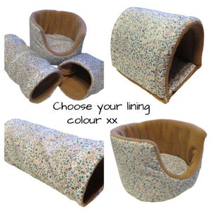 May include: A collection of small pet beds and tunnels featuring a floral pattern in shades of teal, brown, and cream with a solid brown interior lining. The text "Choose your lining colour xx" is displayed in the centre of the image.