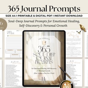 May include: Digital download of a journal with 365 prompts for emotional healing, self-discovery, and personal growth. The image shows a tablet displaying the journal, with sample pages and a coffee cup. The text reads "365 Journal Prompts."