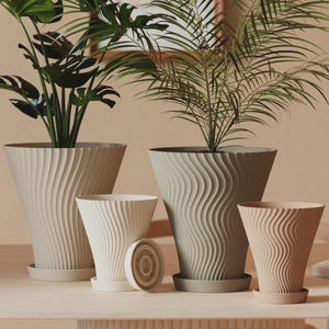 May include: A collection of four tapered plant pots with a vertical wavy texture, each featuring a matching circular saucer. The pots are rendered in varying shades of cream, beige, and sage green, with one pot shown alongside its detached base.
