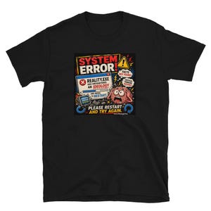 May include: A black short-sleeved t-shirt featuring a graphic print of a computer system error message. The design includes a brain character, text reading SYSTEM ERROR, REALITY.EXE HAS ENCOUNTERED AN IDEOLOGY, and PLEASE RESTART AND TRY AGAIN.