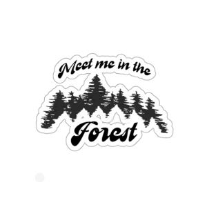 May include: A white sticker with black text and a forest graphic. The text reads "Meet me in the Forest" in a stylized font. The forest graphic is a silhouette of pine trees.