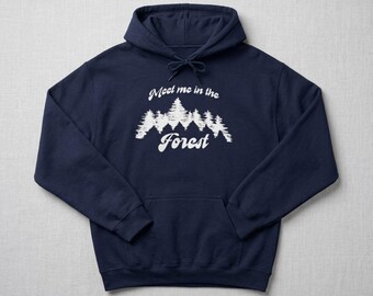 May include: Navy blue hooded sweatshirt with white text and a forest graphic. The text reads "Meet me in the Forest". The sweatshirt has a drawstring hood and a front pocket.