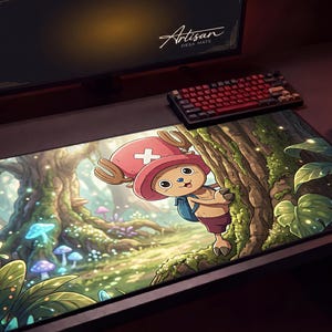 May include: A rectangular desk mat featuring a colorful anime-style illustration of a small, tan, reindeer-like character wearing a pink hat with a white cross, standing in a lush, glowing forest with large trees, green leaves, and blue mushrooms.