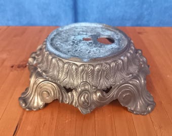 Base de lámpara L&LWMC de aleación fundida con baño de latón para lámparas de doble iluminación.