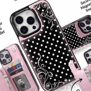 May include: A black phone case with white polka dots and decorative crystal swirls. The case features a pink border, a camera cutout, and an integrated wallet section with slots for credit cards and currency, visible in multiple angles.