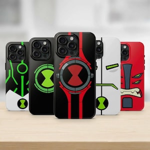 May include: Five phone cases with unique designs. The cases feature black backgrounds with green, red, and white graphics. The designs include geometric shapes and character-inspired artwork. The cases are arranged in a row, showcasing their varied styles.