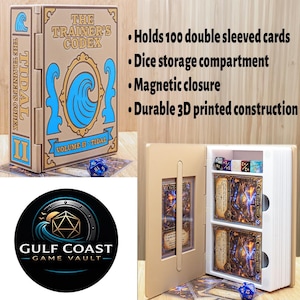 May include: A tan 3D printed card storage box shaped like a book titled The Trainer's Codex Volume II Tidal with blue wave graphics. It features a magnetic closure, a dice compartment, and holds 100 double sleeved cards. Includes a logo for Gulf Coast Game Vault.