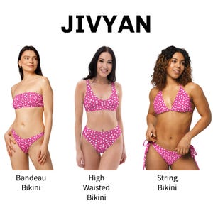 May include: Three pink bikinis with white heart patterns are displayed. The styles are bandeau, high-waisted, and string. The brand name "JIVYAN" is in bold, black text above the swimwear. The image presents a variety of swimwear options.