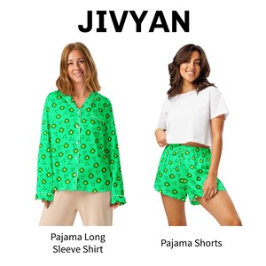 May include: Green pajama set with a floral pattern. The set includes a long-sleeve shirt and shorts. The shirt has white trim and buttons. The shorts have an elastic waistband. The brand name "JIVYAN" is displayed at the top.