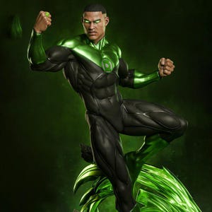 May include: A dynamic statue of the Green Lantern in a striking pose. The figure is clad in a black and green suit with the Green Lantern emblem on the chest. The eyes and a ring glow green, set against a dark green background.