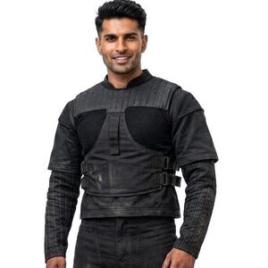 Handcrafted sci-fi galactic bounty hunter 3-piece cosplay costume displaying a custom-made black fabric flight suit and matching armor-ready flak vest on a plain white studio background.