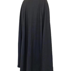 Full-body shot of a high-quality handmade Darth Vader cosplay costume with a long black flowing cape, quilted flight suit jumpsuit, inner tunic, and soft parts, displayed on a model against a clean, solid white background.