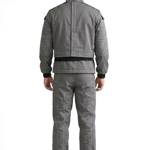 Premium custom-made 3-piece tactical grey cosplay costume featuring a detailed shirt, vest, and matching pants inspired by the Mandalorian, meticulously handcrafted with high-quality fabric for a cinematic-grade look perfect for Star Wars fans, professional cosplay events, comic-cons, and screen-accurate display projects.