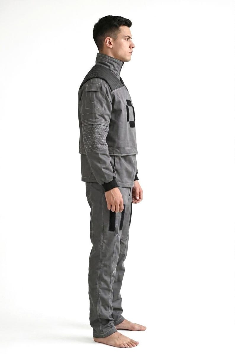 Premium custom-made 3-piece tactical grey cosplay costume featuring a detailed shirt, vest, and matching pants inspired by the Mandalorian, meticulously handcrafted with high-quality fabric for a cinematic-grade look perfect for Star Wars fans, professional cosplay events, comic-cons, and screen-accurate display projects.