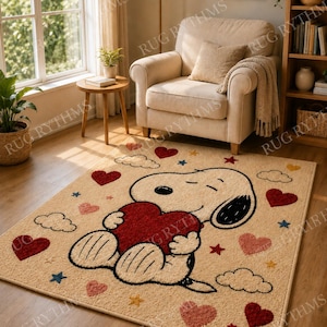 Peut inclure: Un tapis rectangulaire au fond beige représentant un personnage de chien de dessin animé tenant un grand cœur rouge. Le motif comprend des cœurs rouges et roses dispersés, de petites étoiles jaunes et bleues et des contours de nuages blancs.