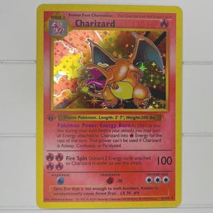 1999 charizard pokemon card 4/102 - cementing its place as a must 1999 first edition charizard pokemon