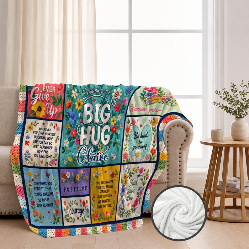 May include: A multi-paneled throw blanket featuring floral patterns and inspirational text including "Sending you a BIG HUG Claire," "Never Give Up," "Be kind to yourself," "Positive," "courage," and "Faith Hope Love."