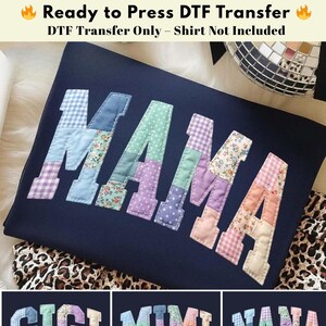 May include: Navy blue DTF transfer with the word "MAMA" in patchwork letters. The letters are made of various patterned fabrics. Additional DTF transfers with the names "GIGI", "MIMI", and "NANA" are also shown.