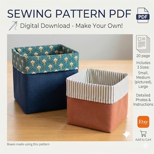 May include: A digital sewing pattern for making fabric storage boxes. The image displays two finished boxes: one navy blue with a teal and gold patterned lining, and one rust-coloured with a striped lining. The pattern includes three sizes and instructions.