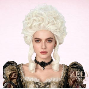 May include: A woman wearing a white, curly wig in a historical style. The wig has a high, voluminous crown and side curls. She is wearing a black choker necklace with a rose pendant and a black and gold patterned dress.