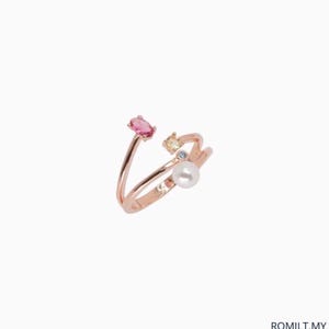 May include: A white ceramic mug with a black handle and the text "But First, Coffee" in a black, handwritten-style font. The mug is on a white surface.