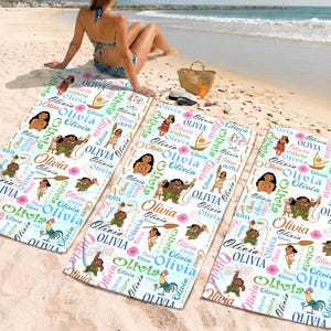 May include: Three rectangular beach towels featuring a repeating pattern of Moana characters, sailboats, and the name Olivia in various colorful fonts. The white towels are decorated with pink hibiscus flowers and brown wooden oars.