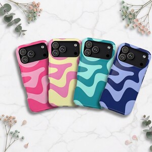 May include: Four smartphone cases featuring a wavy, multi-coloured pattern. The first case is pink and light pink, the second is yellow and light pink, the third is teal and light blue, and the fourth is dark blue and light blue. Each has a black camera cutout.