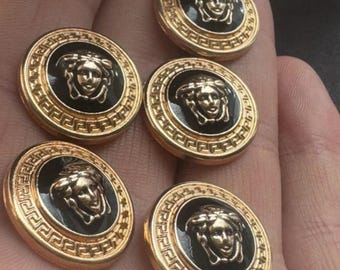 Versace vintage set of five Buttons