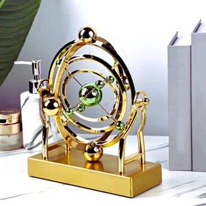 Scultura cinetica dell'orbita celeste - Decorazione da scrivania a moto perpetuo color oro, modello artistico di astronomia, regalo unico per la casa o l'ufficio