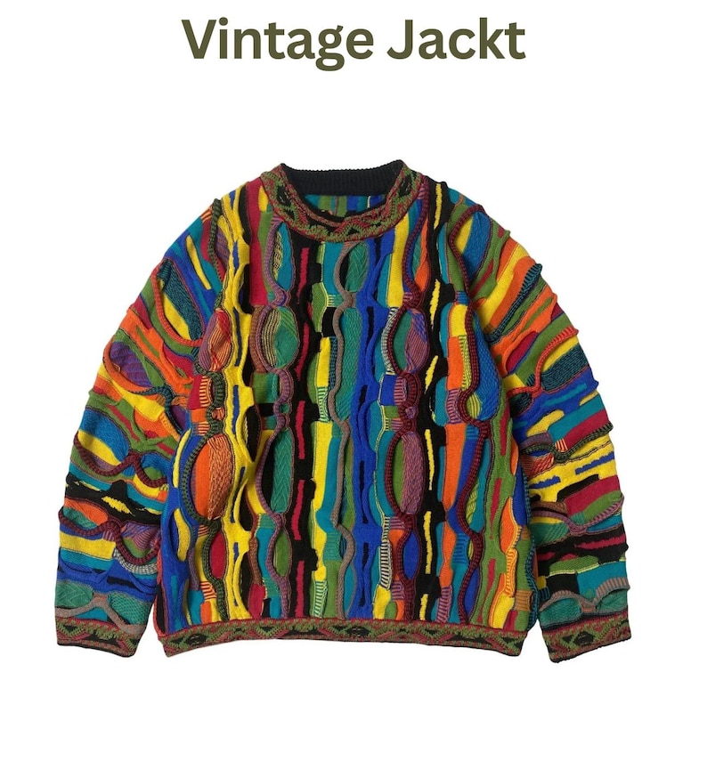 May include: A long-sleeve knit sweater featuring a complex, multi-colored geometric pattern in shades of blue, yellow, red, green, and black. The garment has a crew neckline and a textured, raised weave throughout. The text "Vintage Jackt" appears above.