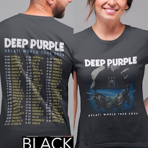 May include: A charcoal gray short-sleeve t-shirt featuring the text DEEP PURPLE SPLAT! WORLD TOUR 2026. The front displays a graphic of a floating rock formation with a central doorway, while the back lists tour dates and locations.