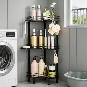 May include: A black metal corner shelf unit with three tiers, holding various bathroom products. The shelves display bottles of shampoo, soap, and lotion, along with a razor, toothbrush, and loofah. The unit is placed next to a washing machine.