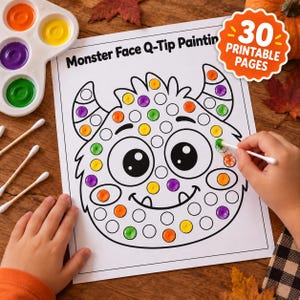 May include: A white paper sheet titled Monster Face Q-Tip Painting featuring a black outline of a monster with large eyes and horns. The monster is partially filled with orange, yellow, purple, and green paint dots. Includes a paint palette and cotton swabs.
