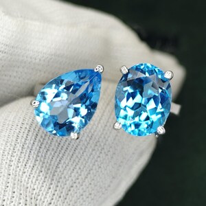 Natural Swiss Blue Topaz Open Band Ring | 9×7 mm Oval & Pear Cut | 925 Solid Silver with White Gold Rhodium | Adjustable Women’s Ring.