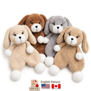 May include: Four plush crochet dog loveys in beige, brown, gray, and tan, each featuring long floppy ears, a white muzzle, and white paws. Below the toys is a PDF file icon with the text English Pattern, a US flag, and a Canadian flag.