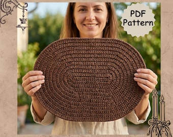 May include: A dark brown oval crochet placemat with a textured, concentric stitch pattern. The image includes the text "Crochet Oval Placemat", "PDF Pattern", and "Instant Download" displayed in a decorative frame with candle graphics.