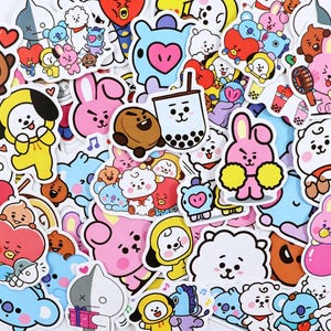 May include: A collection of colorful BT21 character stickers featuring various cartoon figures including a pink rabbit, a white alpaca, a brown cookie, and a blue koala. The stickers display diverse expressions and poses, with some holding items like bubble tea or gifts.