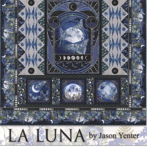 May include: A detailed quilt featuring a celestial theme with the text "LA LUNA by Jason Yenter." The design incorporates various moon phases, night scenes, and a color palette of blues, greens, and white. The quilt has a complex, artistic design.