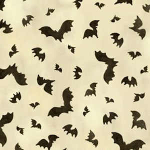 May include: A beige fabric with a repeating pattern of black bats of various sizes. The bats are silhouetted against the beige background.