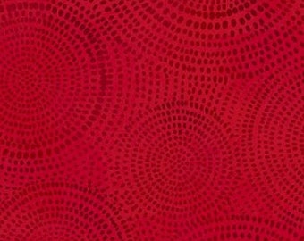 May include: Red fabric with a repeating pattern of concentric circles made of small dots.