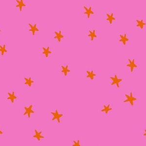 May include: Pink fabric with a scattered pattern of orange stars. The stars are hand-drawn in a simple, irregular style. The fabric is from the Ruby Star Society.