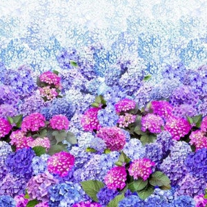 May include: A vibrant floral pattern featuring a dense arrangement of hydrangea blooms in shades of blue, purple, and pink. Green leaves are interspersed among the flowers, creating a lush, colorful design. The background fades from light blue to white.
