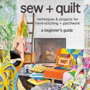 May include: A book titled "sew + quilt" with a subtitle "techniques & projects for hand-stitching + patchwork a beginner's guide" by Susan Beal. The cover features a colorful patchwork quilt with a variety of patterns and colors.
