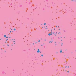 May include: A pink background is speckled with small, irregular dots in shades of red, blue, orange, and pink. The dots are scattered across the surface, creating a playful and textured pattern. The design is simple and visually appealing.