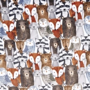 May include: A repeating pattern of woodland animals including foxes, bears, raccoons, owls, and deer. The animals are depicted in a watercolor style with soft colors of brown, orange, gray, and blue on a white background. The design is suitable for fabric or wallpaper.