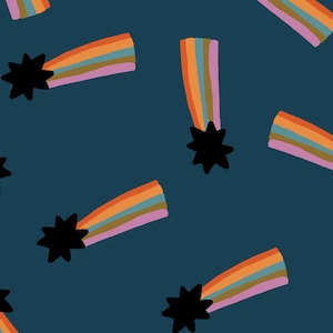 May include: A repeating pattern of colorful rainbows and black starbursts on a dark teal background. The rainbows feature bands of orange, yellow, green, and purple. The design is whimsical and playful.