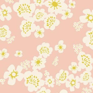 May include: A repeating pattern of white and yellow floral blossoms on a soft pink background. The flowers vary in size and are scattered across the surface, creating a delicate and airy design. The blossoms have yellow centers.