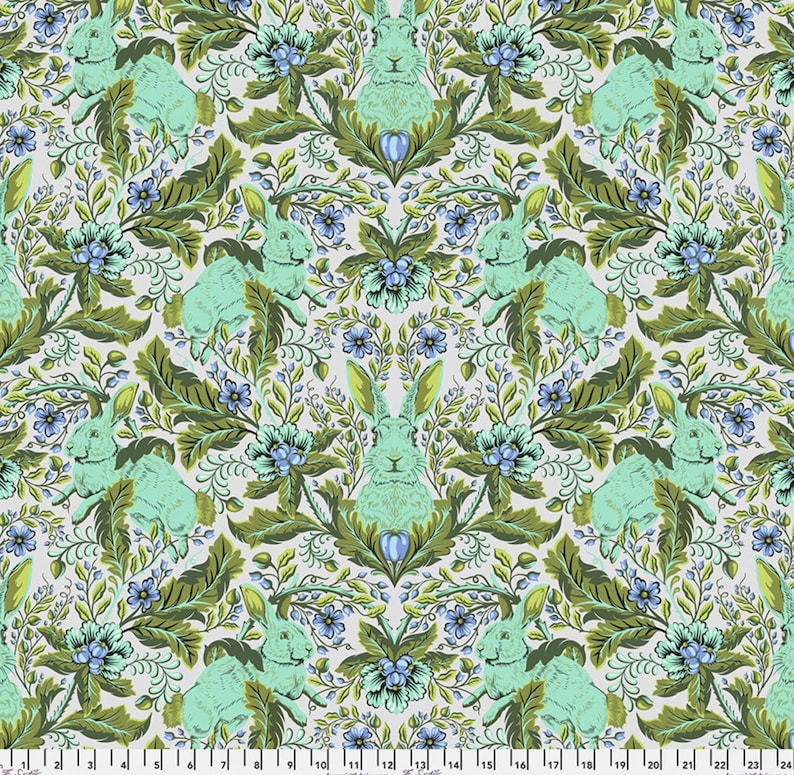 May include: A repeating pattern featuring stylized mint green rabbits, blue flowers, and green foliage on a light grey background. The design has a vintage, ornate feel, with symmetrical arrangements of the elements.